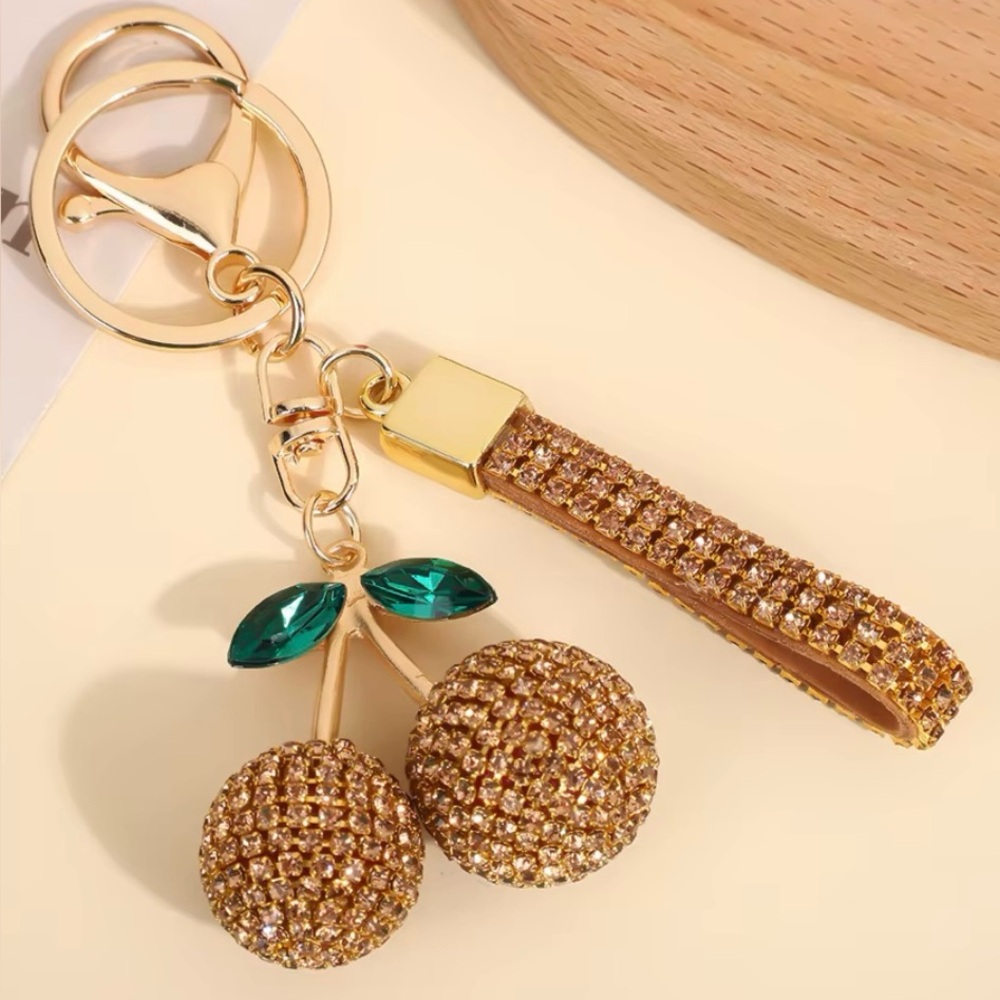 NIP Gold-tone rhinestone cherry keychain bag charm. 🍎 🍃